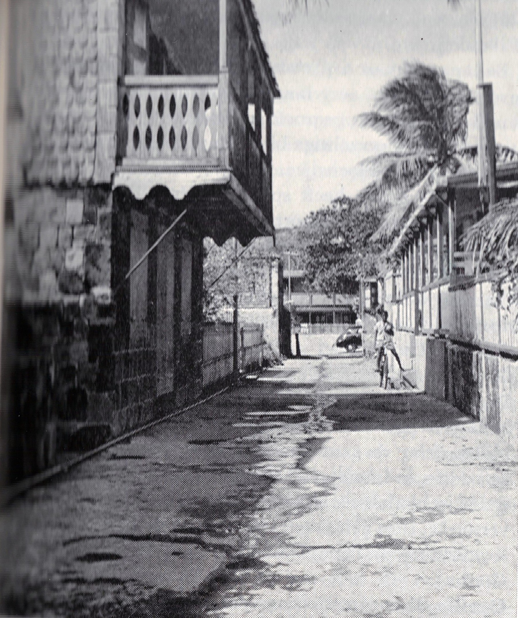 Statia - Gallery overtrading the road is the home of Mr. Arthur Valk.