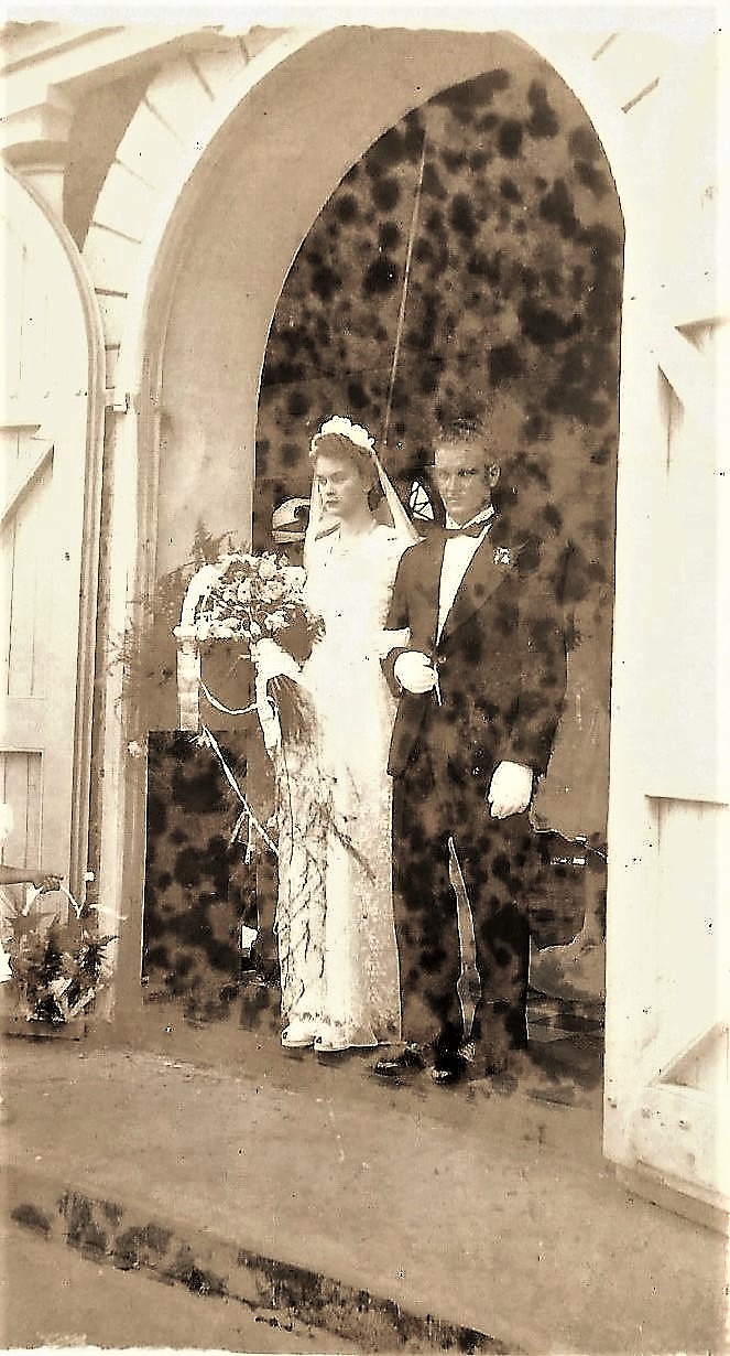 Henry Earl Johnson and his wife Olga Johnson on their wedding day. The Bottom church.