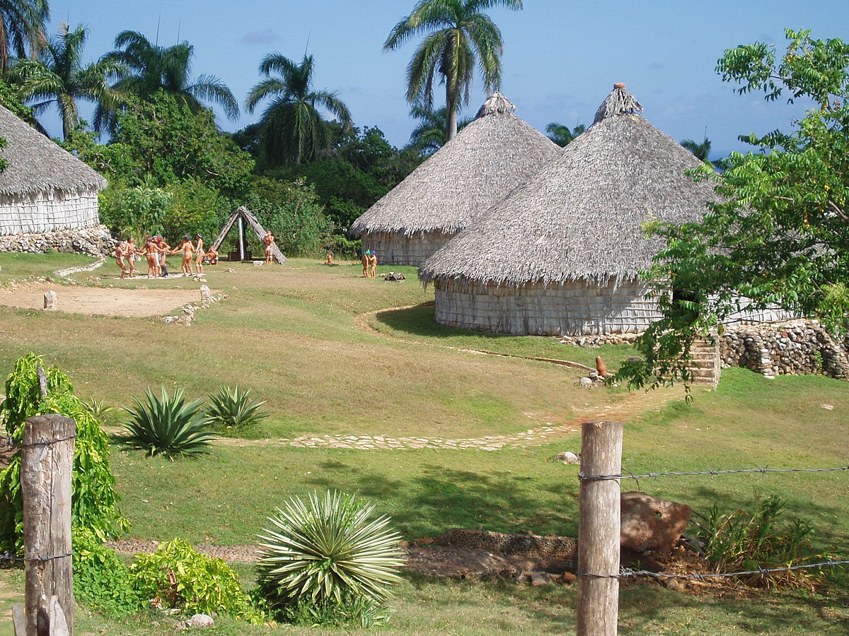 1200px-Reconstruction_of_Taino_village_Cuba